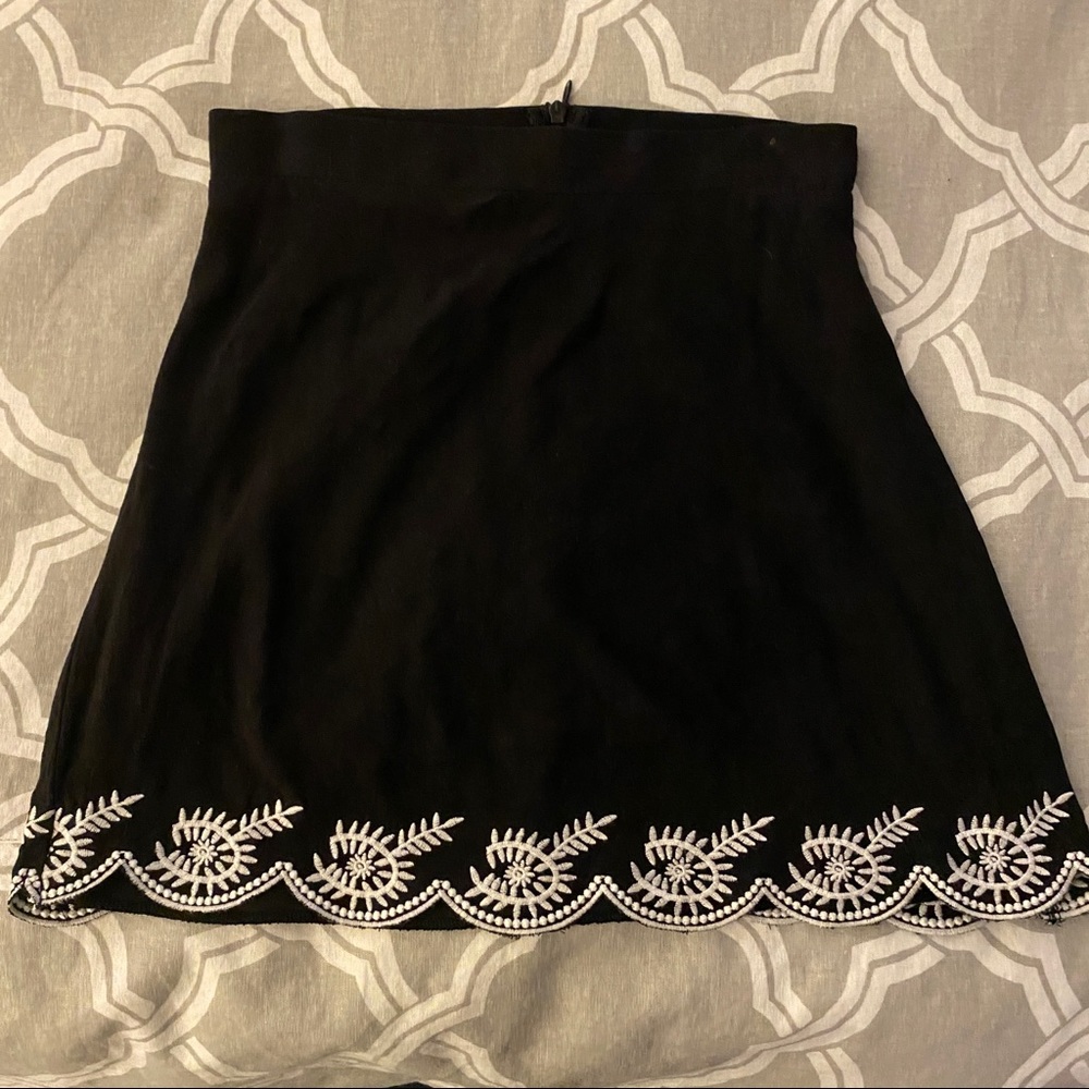 Black skirt with embroidered trim